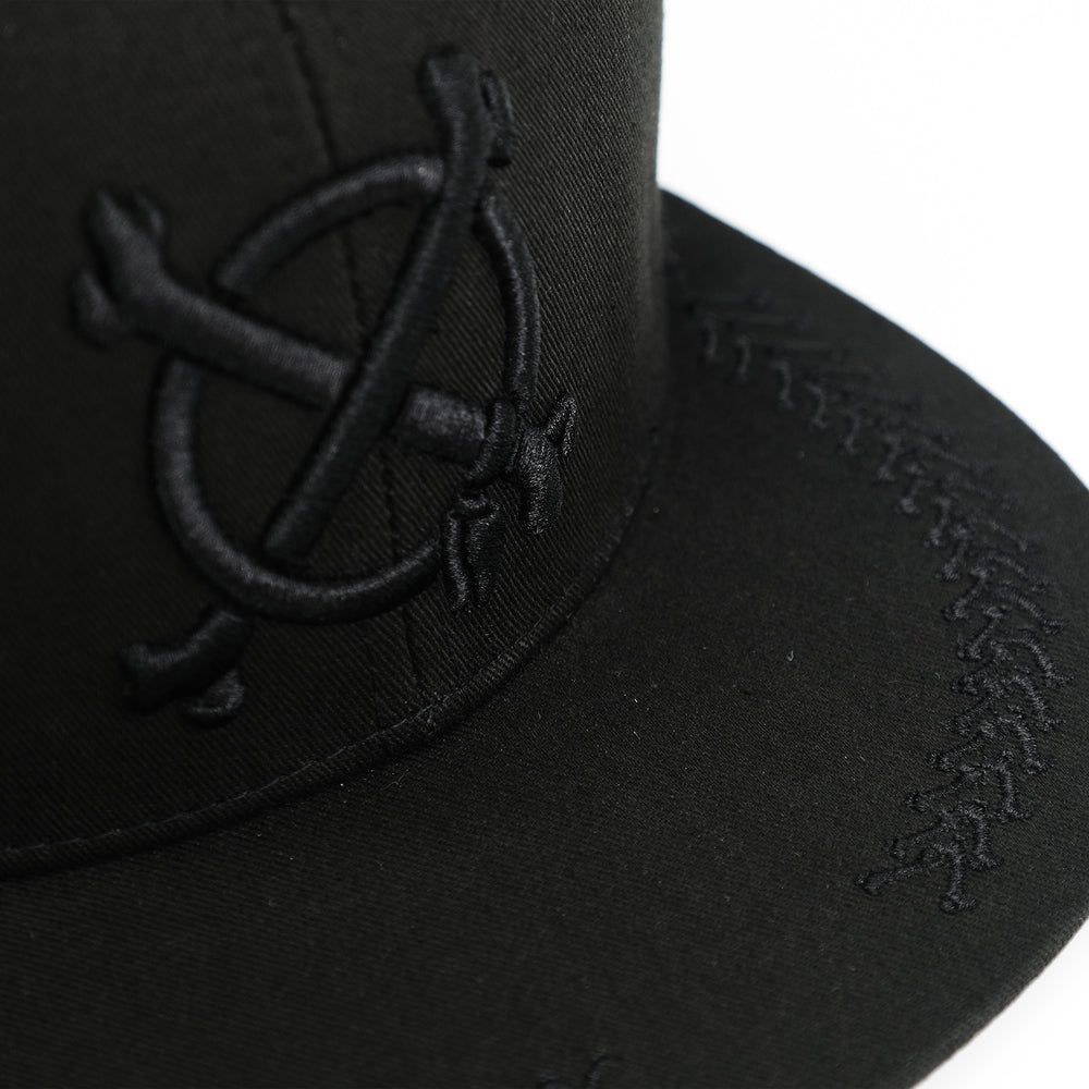 CROSSBONES 21 SNAPBACK